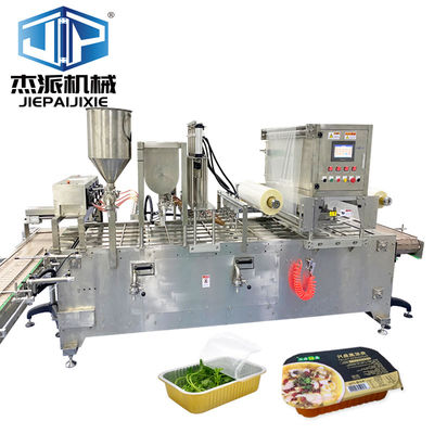 Machine de remplissage et d'étanchéité de plateaux en plastique pour plateaux de conserveurs de fruits de mer